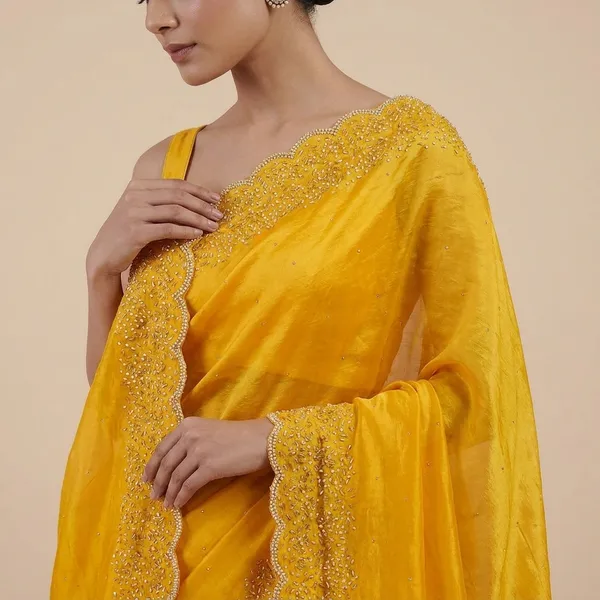 Elegant_Yellow_Chiffon_Saree_With_Embellished_Border