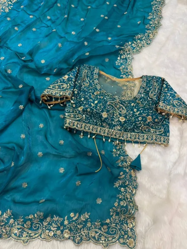 Teal_Blue_Embroidered_Silk_Saree_With_Heavy_Golden_Border_Work