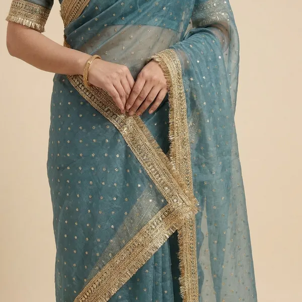 Women'S_Teal_Blue_Saree_With_Gold_Border_And_Embellishments