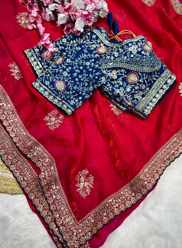 Red_Silk_Saree_With_Embellished_Blue_Blouse