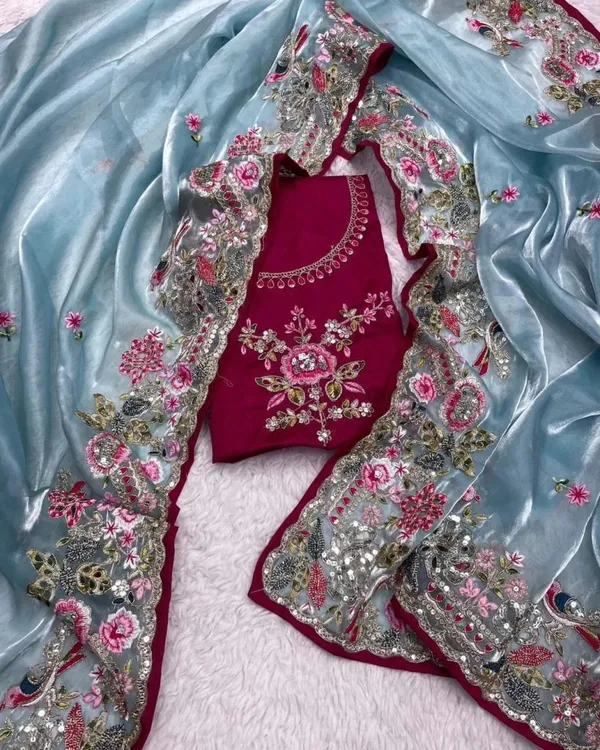 Sky_Blue_Embroidered_Organza_Saree_With_Floral_Border_And_Red_Blouse