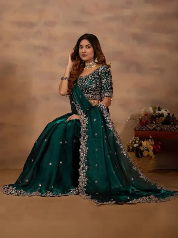Elegant_Teal_Green_Embellished_Saree_With_Silver_Border_And_Sequin_Work