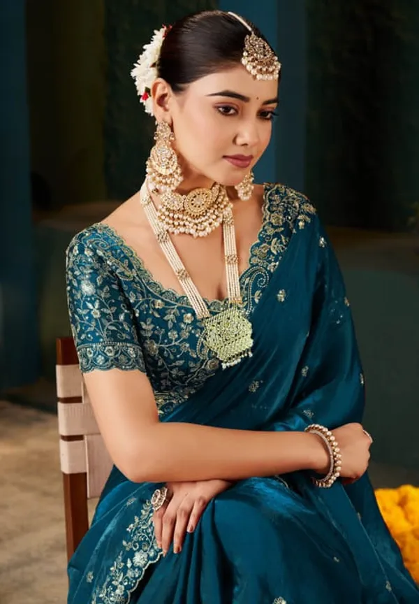 Teal_Blue_Embroidered_Saree_With_Pearl_Jewelry_Set