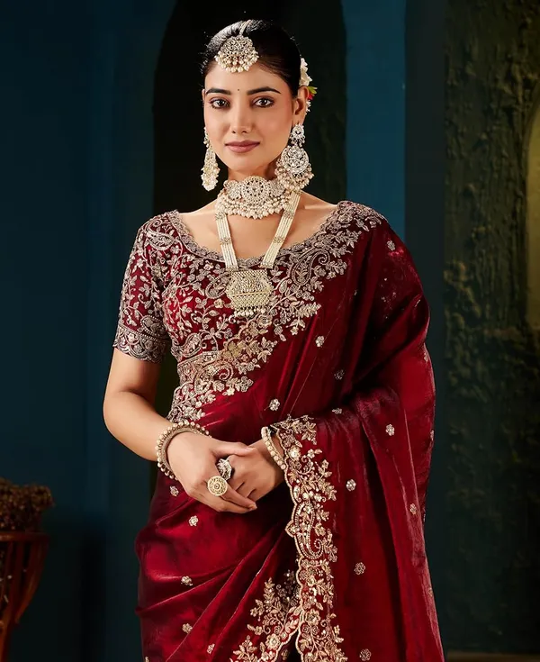 Maroon_Velvet_Embroidered_Saree_With_Heavy_Zari_Work_And_Designer_Blouse
