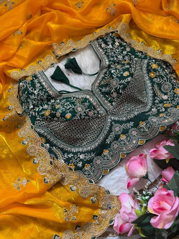 Yellow_Organza_Silk_Saree_With_Embroidered_Blouse_And_Golden_Border