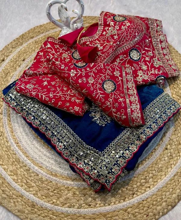 Navy_Blue_Silk_Saree_With_Golden_Border_And_Red_Embroidered_Blouse