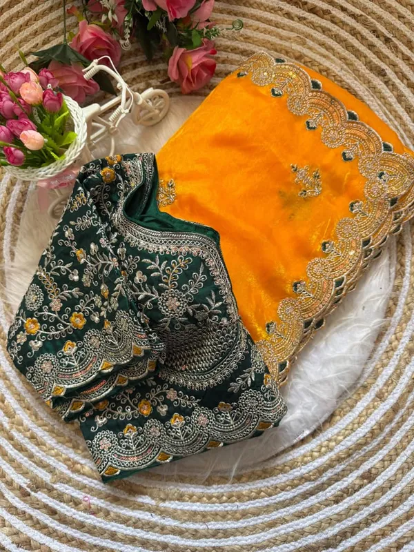 Yellow_Organza_Silk_Saree_With_Embroidered_Blouse_And_Golden_Border