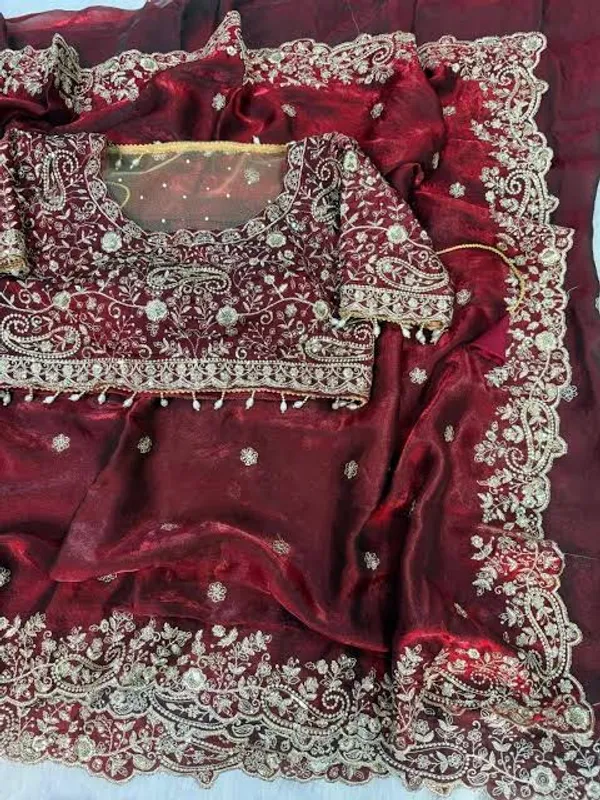 Maroon_Velvet_Embroidered_Saree_With_Heavy_Zari_Work_And_Designer_Blouse