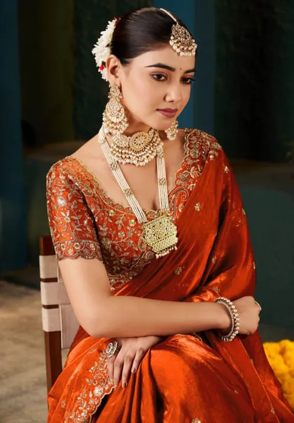 Traditional_Red_Silk_Saree_With_Embroidered_Blouse_And_Gold_Jewelry_Set