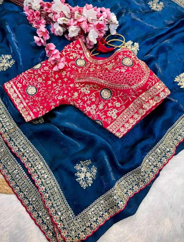Navy_Blue_Silk_Saree_With_Golden_Border_And_Red_Embroidered_Blouse