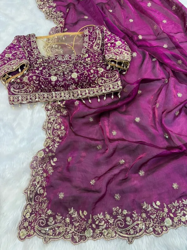 Purple_Embroidered_Silk_Saree_With_Heavy_Border_Work_And_Blouse