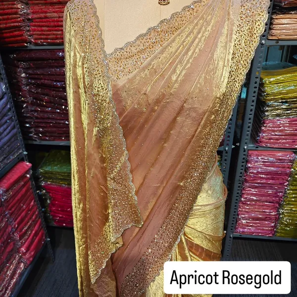 Apricot_Rose_Gold_Net_Saree_With_Heavy_Sequin_And_Embroidery_Work