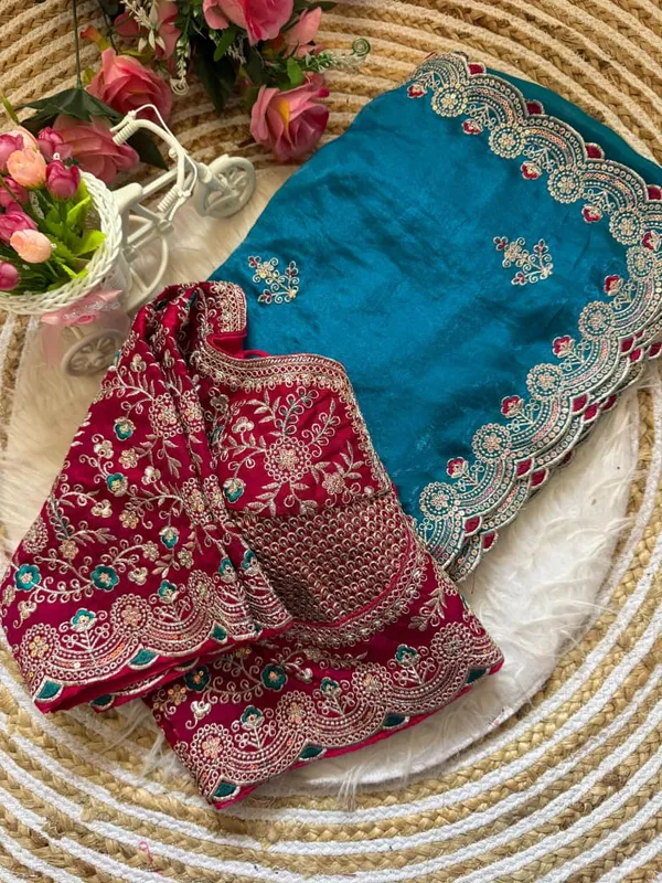 Teal_Blue_Embroidered_Wedding_Saree_With_Pink_Sequin_Blouse