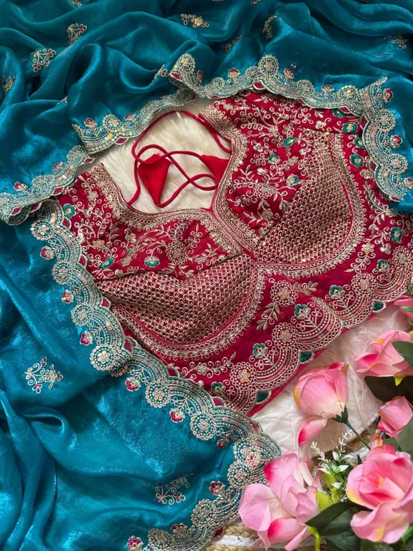 Teal_Blue_Embroidered_Wedding_Saree_With_Pink_Sequin_Blouse