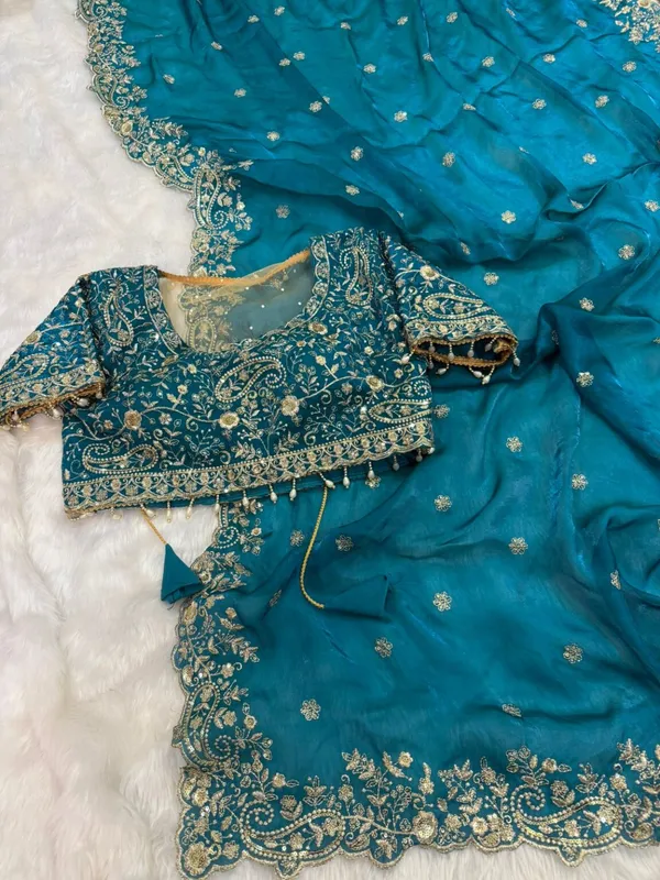 Teal_Blue_Embroidered_Silk_Saree_With_Heavy_Golden_Border_Work