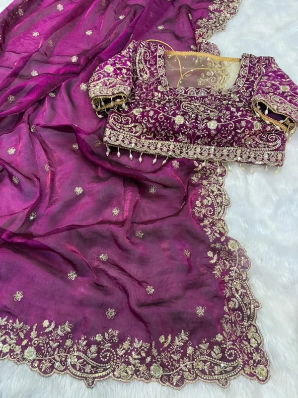 Purple_Embroidered_Silk_Saree_With_Heavy_Border_Work_And_Blouse