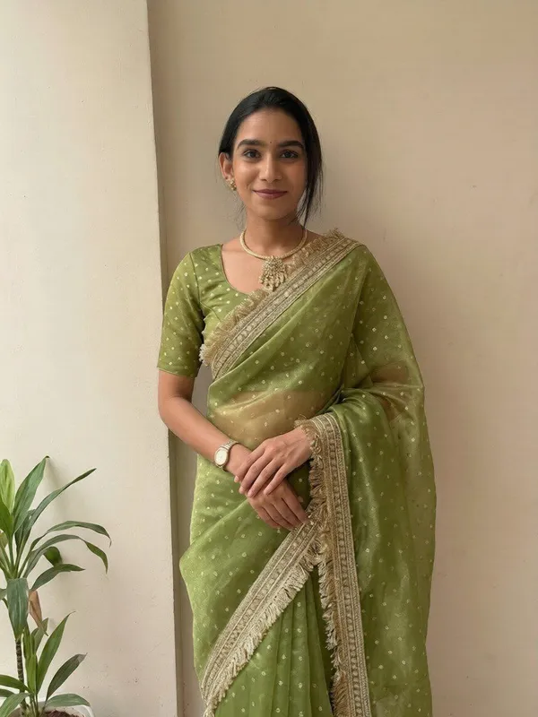 Olive_Green_Organza_Saree_With_Golden_Embroidered_Border_And_Blouse_Piece