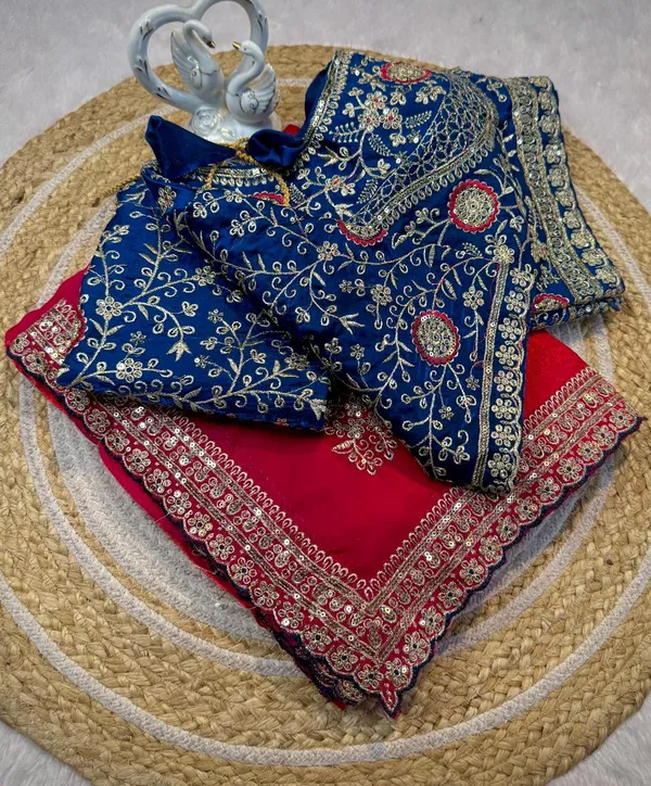 Red_Silk_Saree_With_Embellished_Blue_Blouse