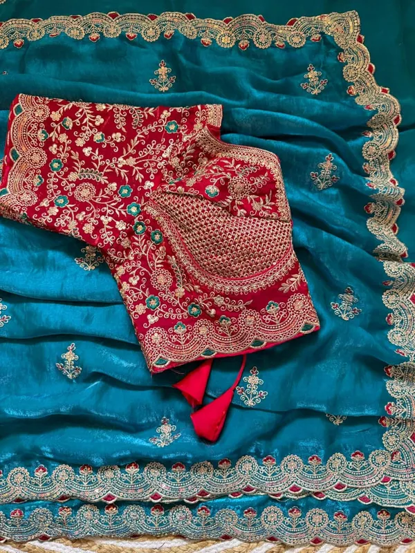 Teal_Blue_Embroidered_Wedding_Saree_With_Pink_Sequin_Blouse