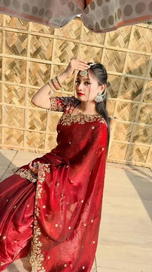 Red_Embellished_Saree_With_Golden_Embroidery_And_Sheer_Sleeves