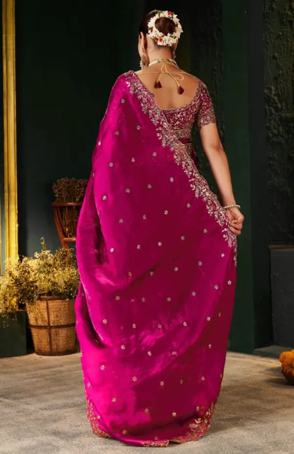 Magenta_Pink_Embroidered_Saree_With_Designer_Blouse_And_Heavy_Jewelry_Set