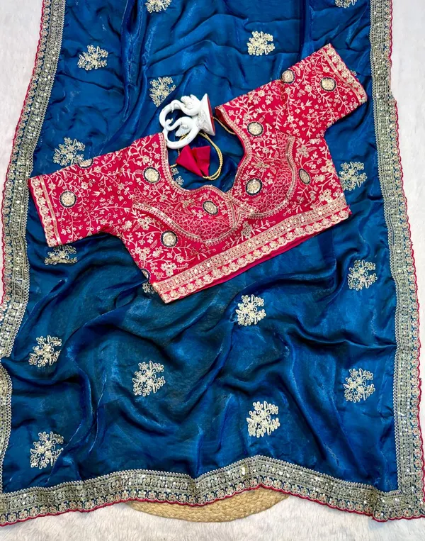 Navy_Blue_Silk_Saree_With_Golden_Border_And_Red_Embroidered_Blouse