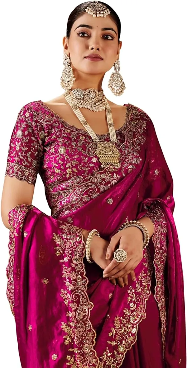 Pink_Embroidered_Silk_Saree_With_Heavy_Blouse_And_Pearl_Necklace