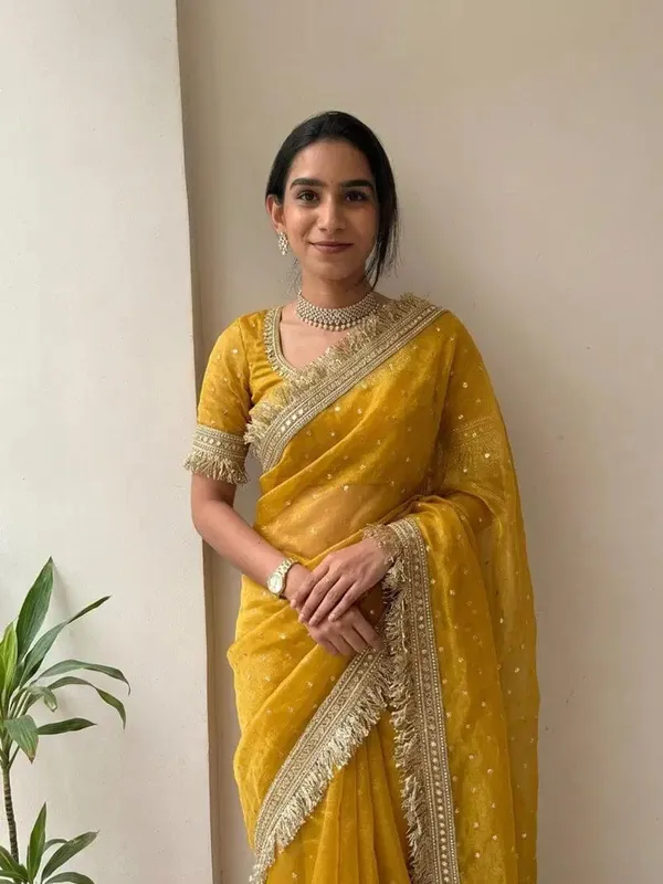 Mustard_Yellow_Georgette_Saree_With_Heavy_Golden_Embroidered_Border