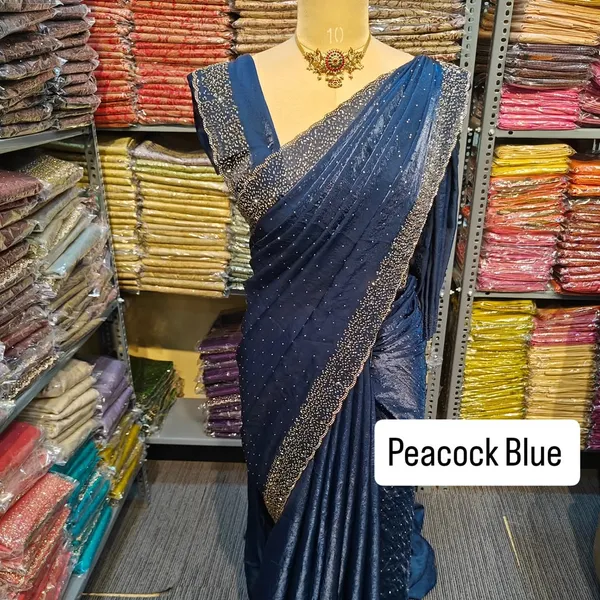 Peacock_Blue_Saree_With_Embellished_Border