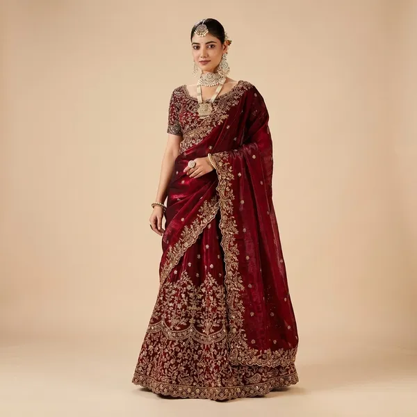 Maroon_Bridal_Lehenga_Choli_With_Heavy_Gold_Embroidery_Work