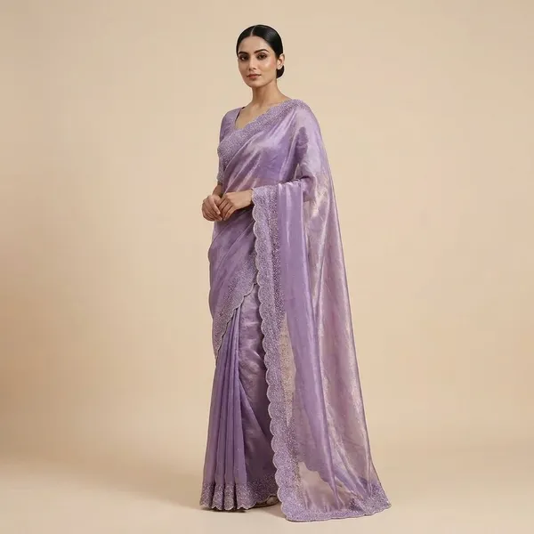 Purple_Embroidered_Net_Saree_With_Lace_Border_And_Blouse_Piece