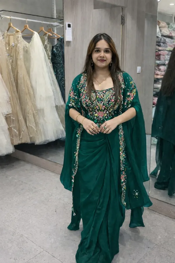 Indo_Western_Draped_Dhoti_Set_With_Long_Shrug_Dark_Green