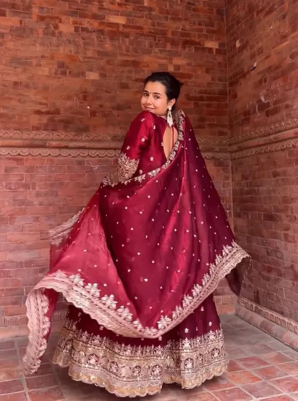 Embroidered_Pure_Fendy_Silk_Anarkali_Referring_To_The_Heavy_Silk_Style_Fabric_And_Gold_Zari_Sequin_Work