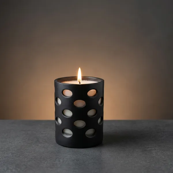 Black_Ceramic_Contemporary_Perforated_Candle_Holder_With_Wax_Candle