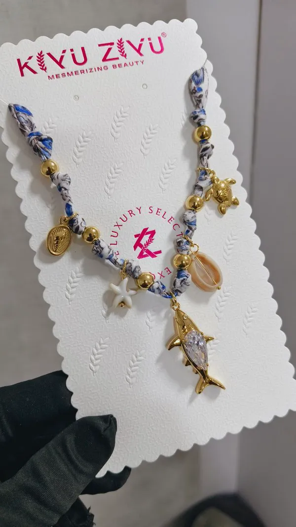 Gold_Alloy_Braided_Dolphin_Fish_Charm_Bracelet_For_Women