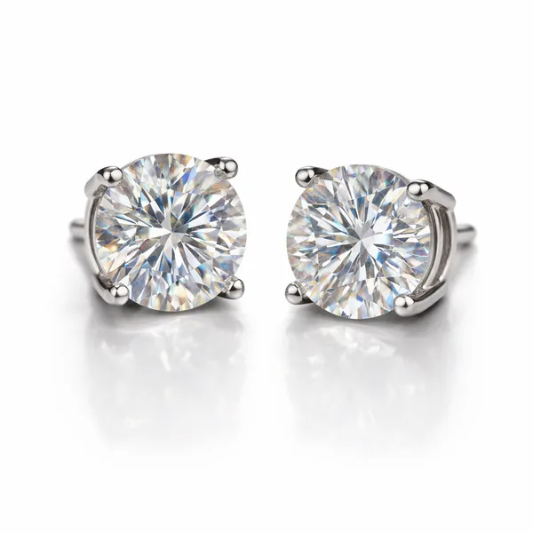 Solitaire_ear_studs_in_925_Silver_in_four_prong_setting_with_classic_round_bright_white_solitaire
