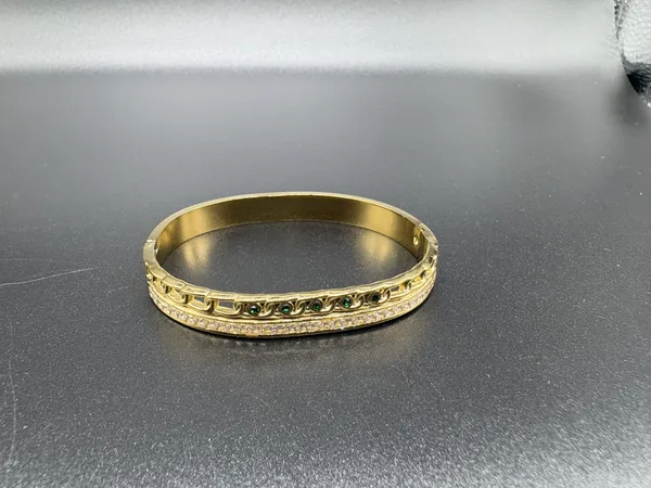 Gold_Alloy_Carved_Floral_Bangle_Bracelet_For_Women