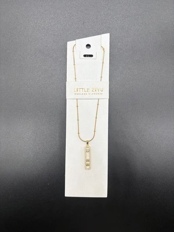 Gold_Alloy_Vertical_Crystal_Pendant_Necklace_For_Women
