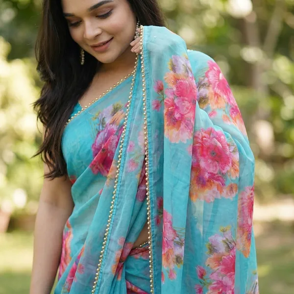 Turquoise_Blue_Floral_Print_Saree_With_Golden_Border_For_Women