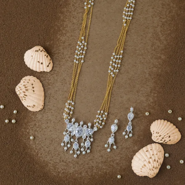 Copper_Base_With_Gold_Plated_Swarn_Chandrika_Rice_Pearl_Tanmani