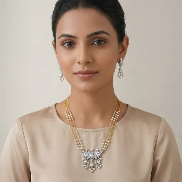 Copper_Base_With_Gold_Plated_Swarn_Chandrika_Rice_Pearl_Tanmani