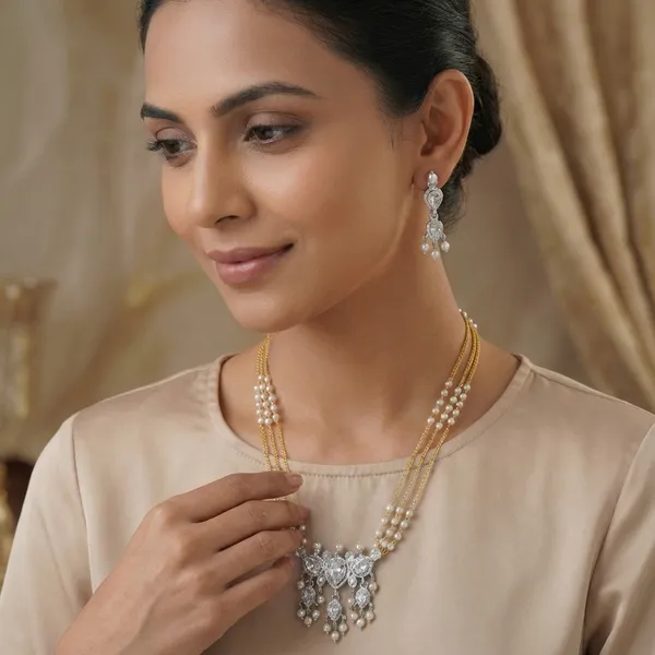 Copper_Base_With_Gold_Plated_Swarn_Chandrika_Rice_Pearl_Tanmani