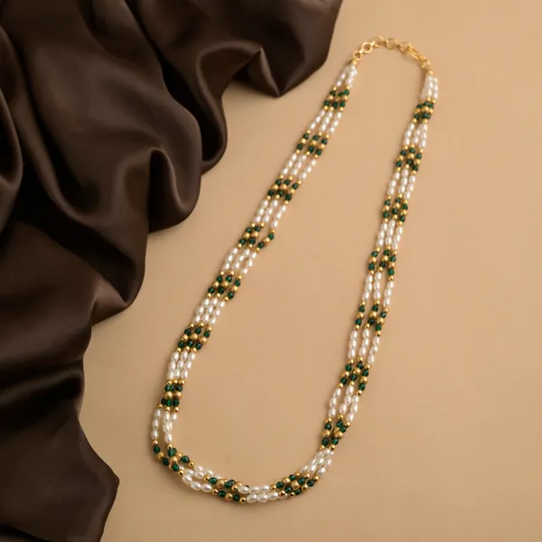 Copper_Base_With_Gold_Plated_Triveni_Green_Crystal_And_Rice_Pearl_Mala