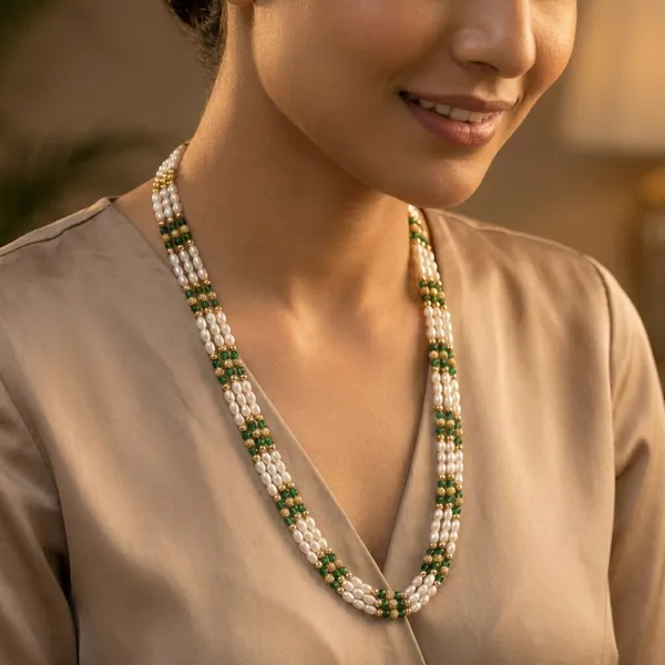 Copper_Base_With_Gold_Plated_Triveni_Green_Crystal_And_Rice_Pearl_Mala