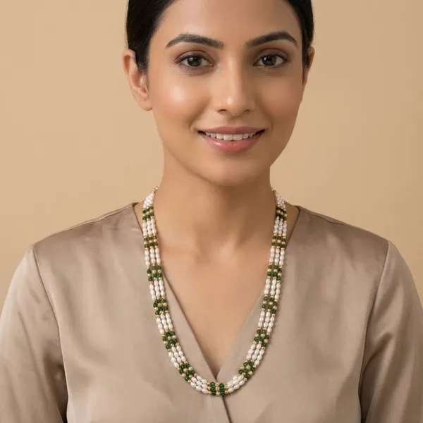 Copper_Base_With_Gold_Plated_Triveni_Green_Crystal_And_Rice_Pearl_Mala