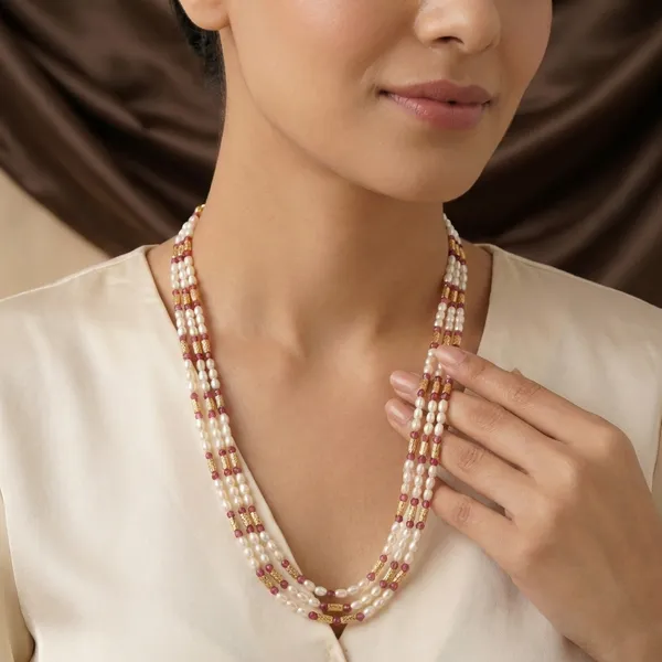 Copper_Base_With_Gold_Plated_Triveni_Red_Crystal_And_Rice_Pearl_Mala