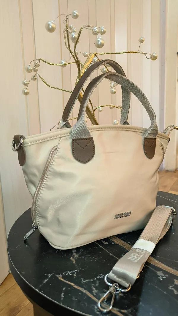 Premium_2_in_1_Tote_cum_Sling_Bag_Imported_Nylon_Lycra_one_main_compartment_with_zip_pockets_inside_and_expandable