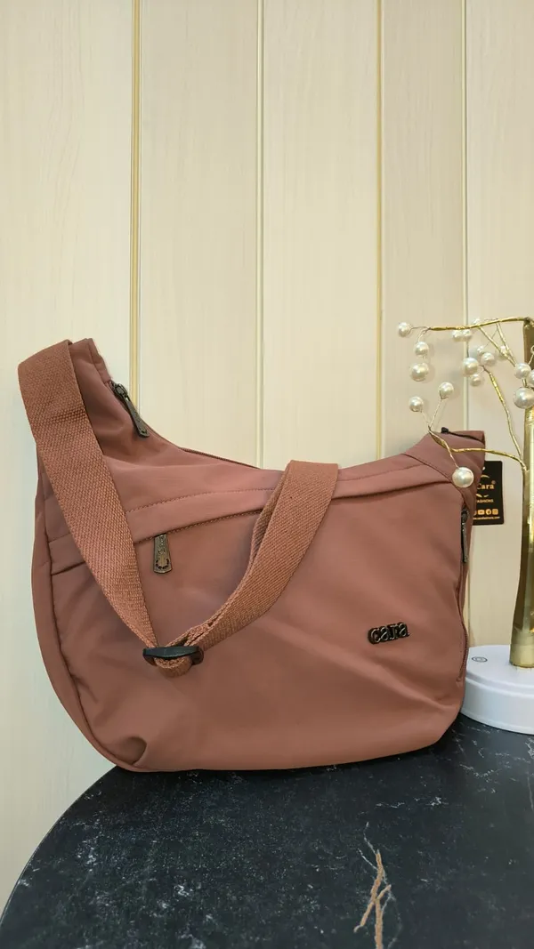Stylish_Moon_Sling_Bags_Premium_Nylon_Lycra_Imported_Material_super_light_weight_apt_for_college,_office,_travel_or_outings_with_multiple_sturdy_zip_compartments_Caramel_Brown