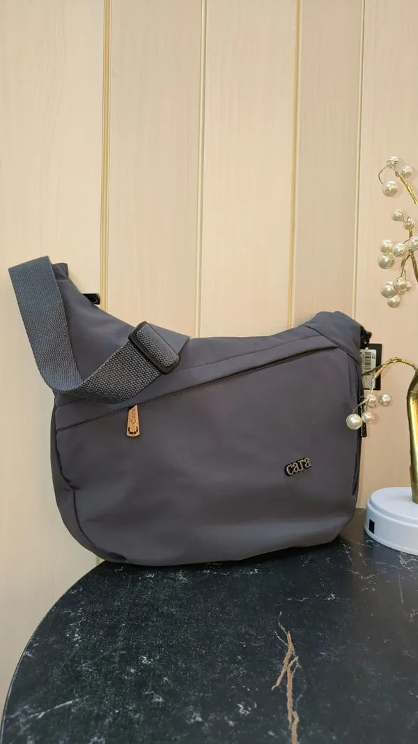 Stylish_Moon_Sling_Bags_Premium_Nylon_Lycra_Imported_Material_super_light_weight_apt_for_college,_office,_travel_or_outings_with_multiple_sturdy_zip_compartments_Ash_Grey