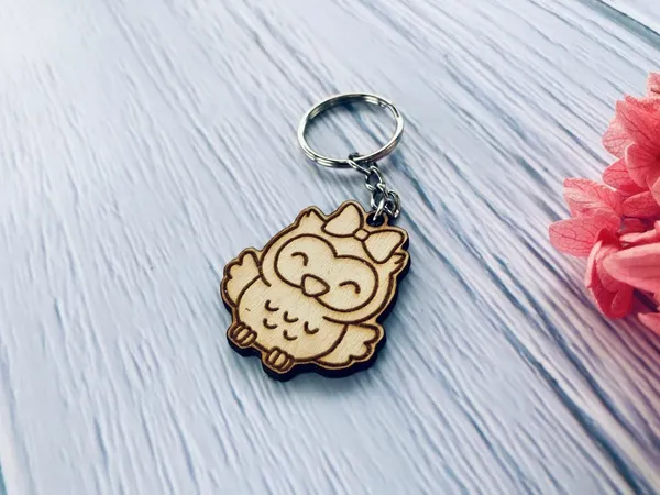 Beige_Clths_Wooden_Keychains_That_Are_Used